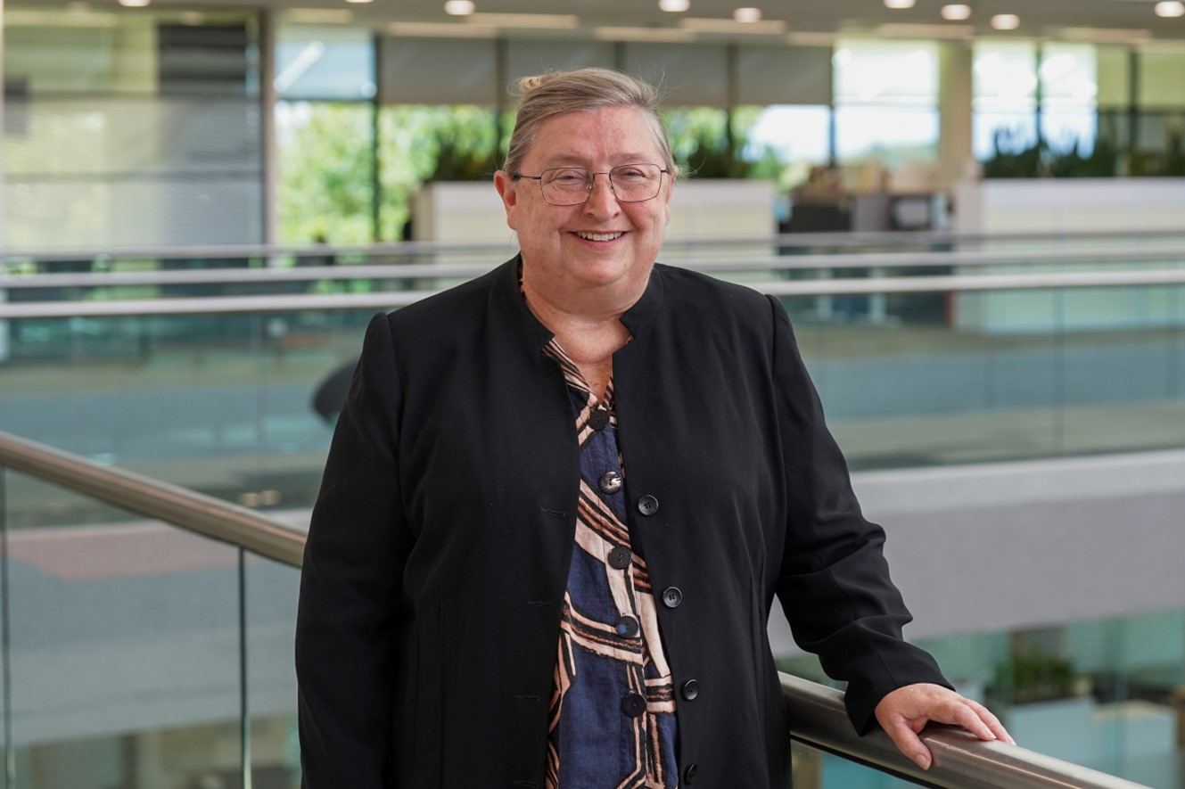 Marina Costelloe stands in the foyer at Geoscience Australia.
