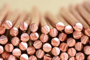 Electrical power cable close-up with selective focusCopper wire raw materials and metals industry and stock market concept